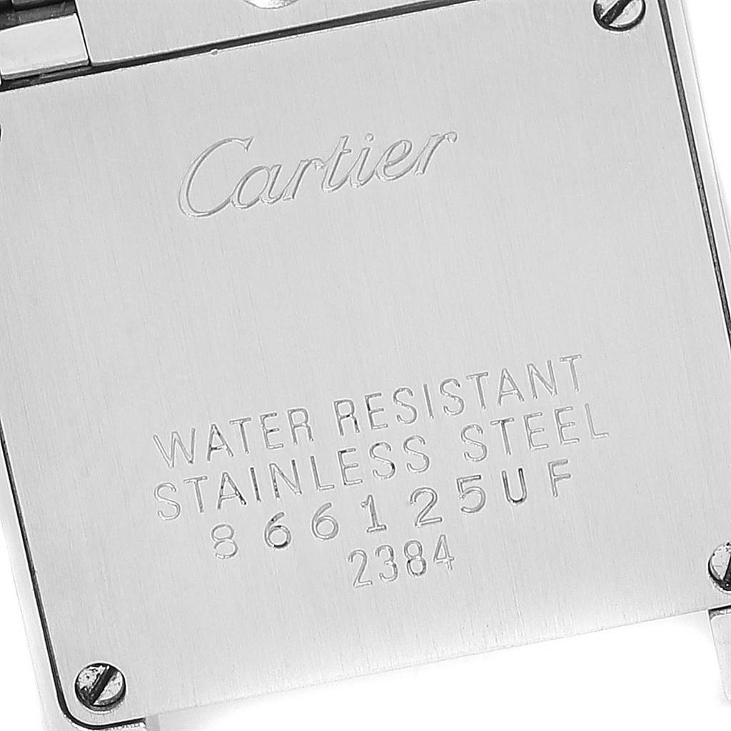 The image shows the back case of a Tank Francaise watch by Cartier, highlighting its water resistance, material, and serial number.