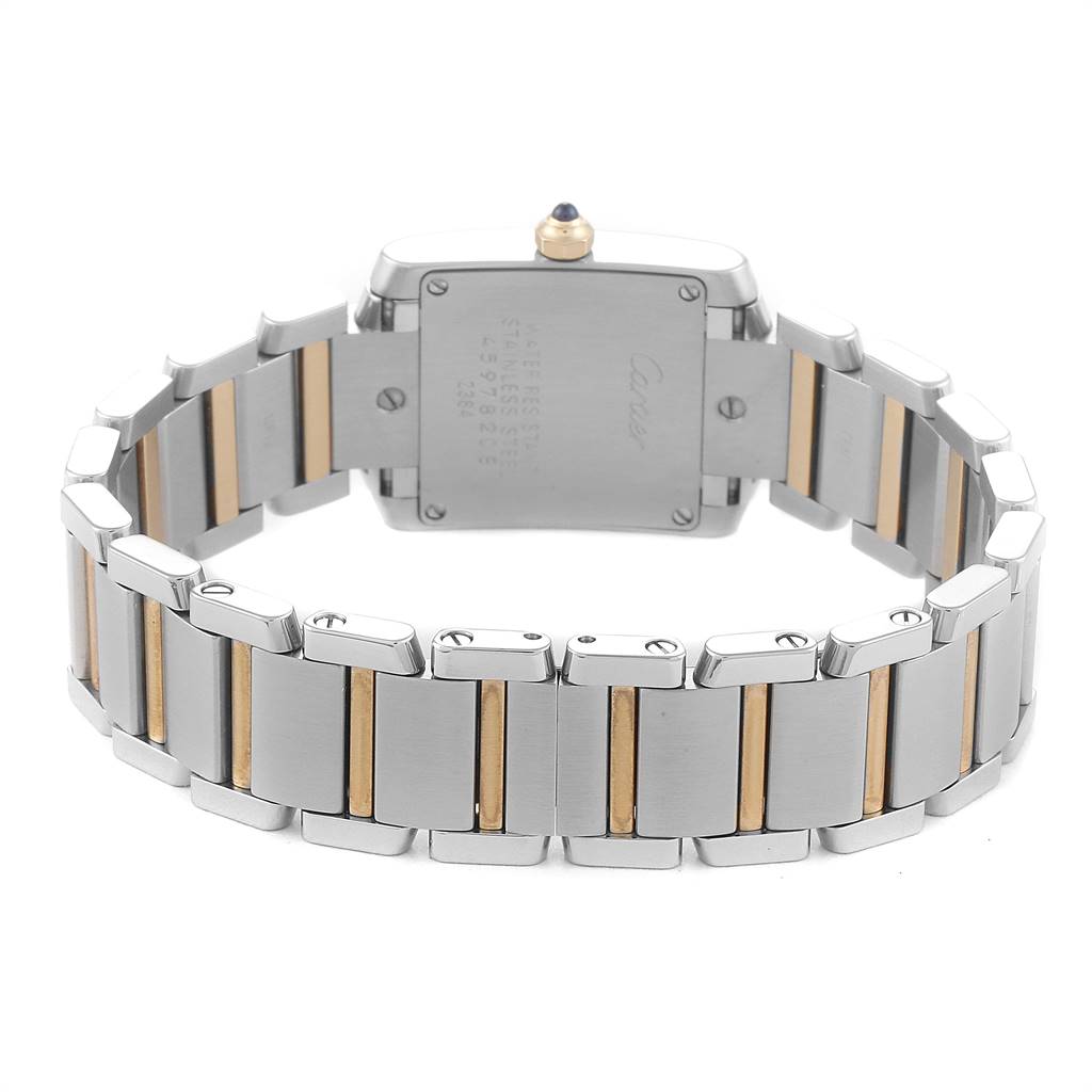 This image shows the back and bracelet of a Cartier Tank Française watch.