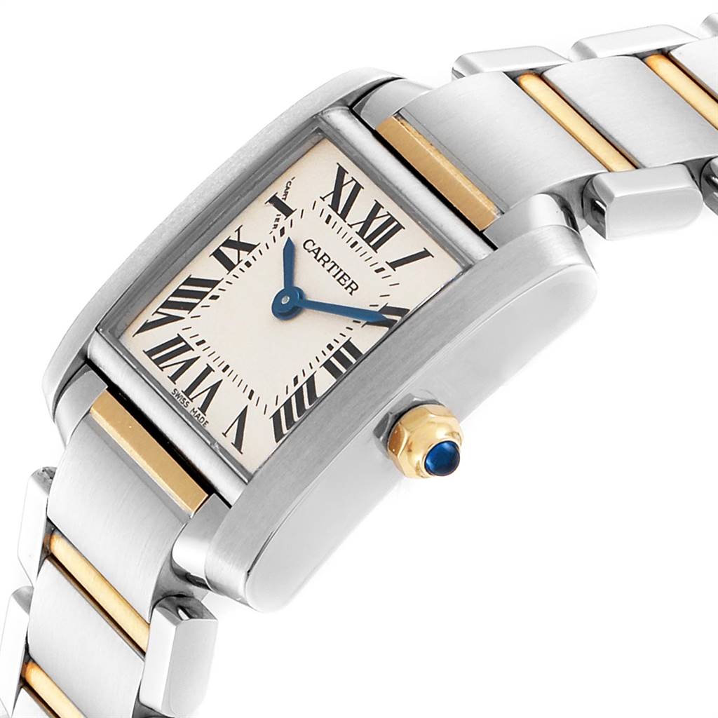 This image shows a close-up, angled view of the Cartier Tank Francaise W51007Q4 Women's Steel and Gold (two tone) Silver Dial W51007Q4 Women's Steel and Gold (two tone) Silver Dial watch featuring its dial, crown, and part of the bracelet.