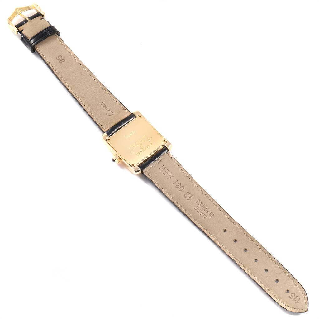 The image shows the back view of a Cartier Tank Francaise W50003N2 Women's Yellow Gold Silver Dial W50003N2 Women's Yellow Gold Silver Dial watch with its leather strap fully extended.