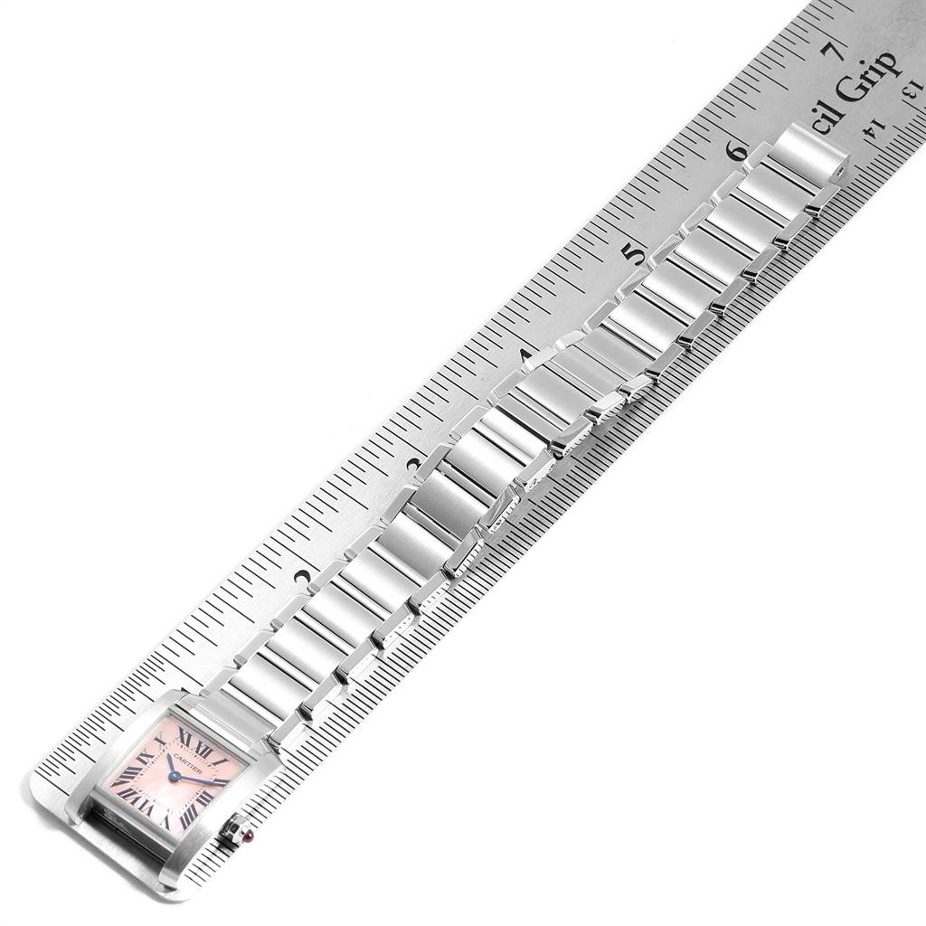 The image shows a Cartier Tank Francaise W51028Q3 Women's Stainless Steel Mother of Pearl Dial W51028Q3 Women's Stainless Steel Mother of Pearl Dial watch laid flat next to a ruler, with the case and bracelet links visible.