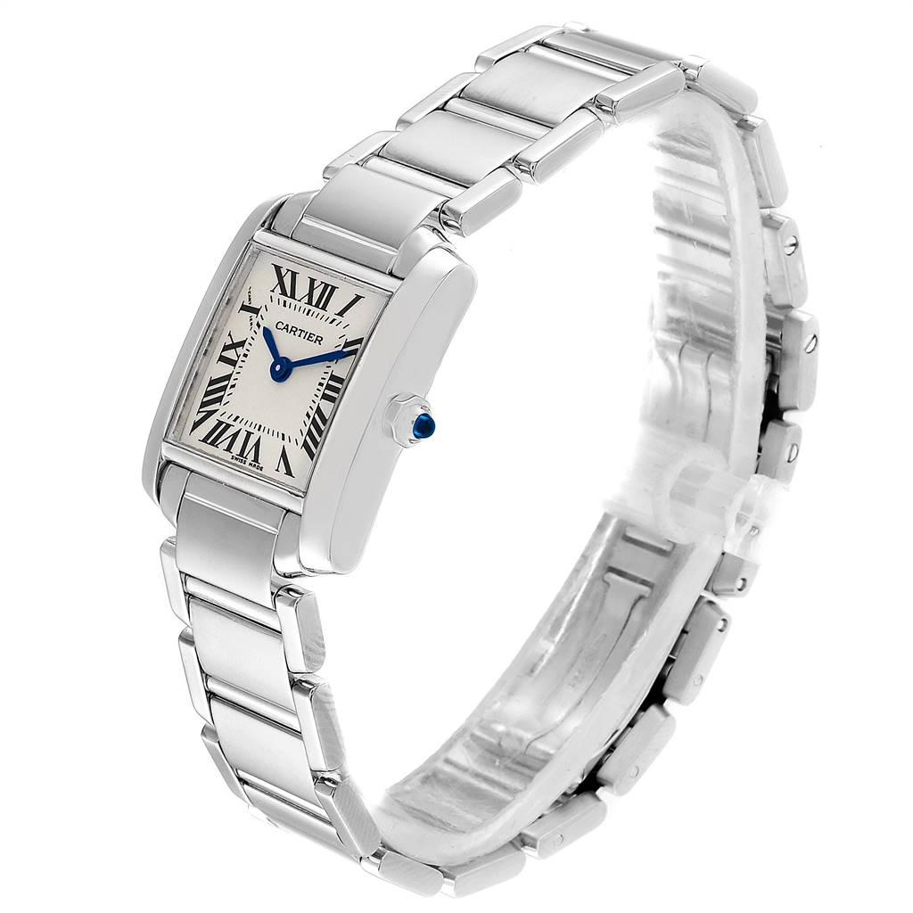 The Cartier Tank Française watch is shown from a side/front angle, featuring its rectangular face, Roman numeral dial, and metal bracelet.