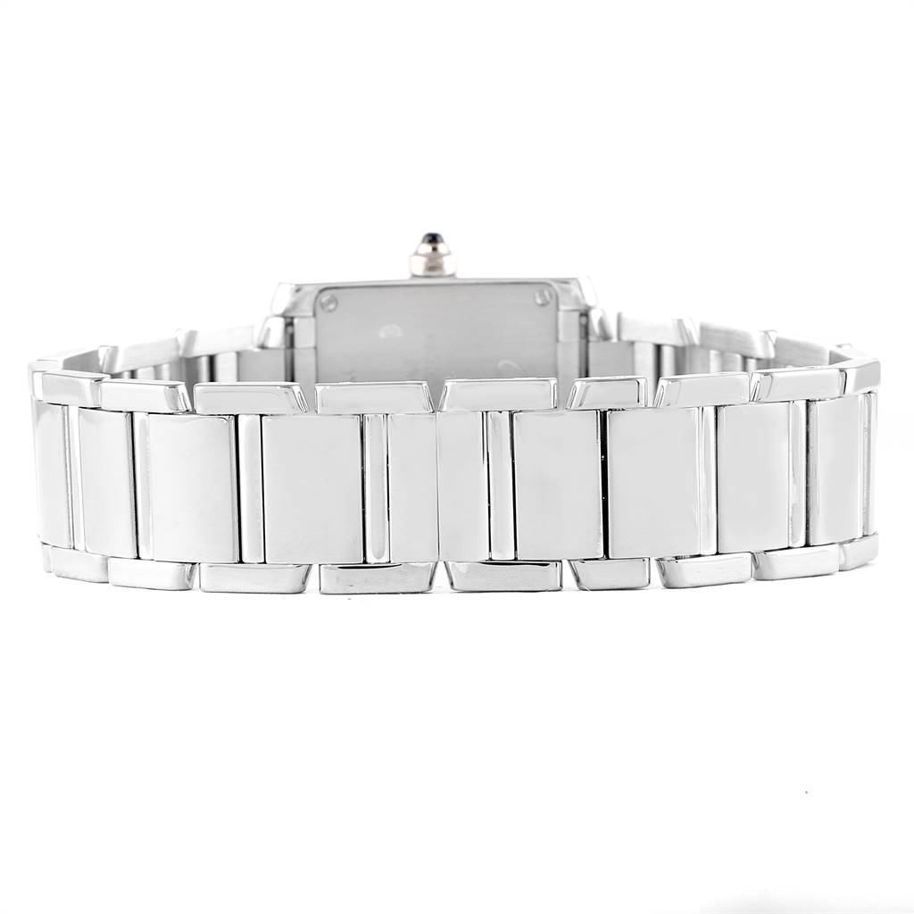 The image shows the back view of the Tank Francaise watch by Cartier, highlighting its metal bracelet.