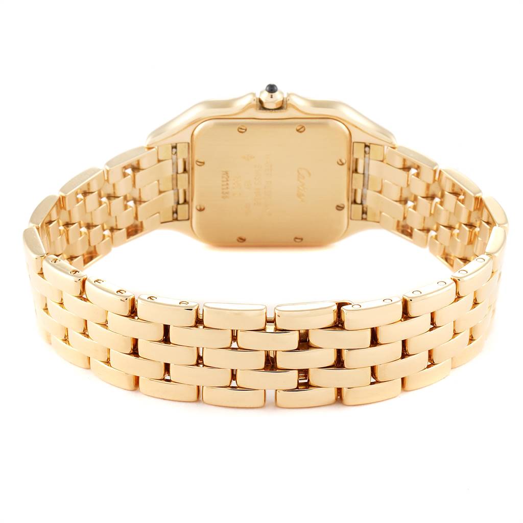 This image shows the back and gold bracelet of a Cartier Tank Francaise W25014B9 Yellow Gold Silver Dial W25014B9 Yellow Gold Silver Dial watch from a rear angle.