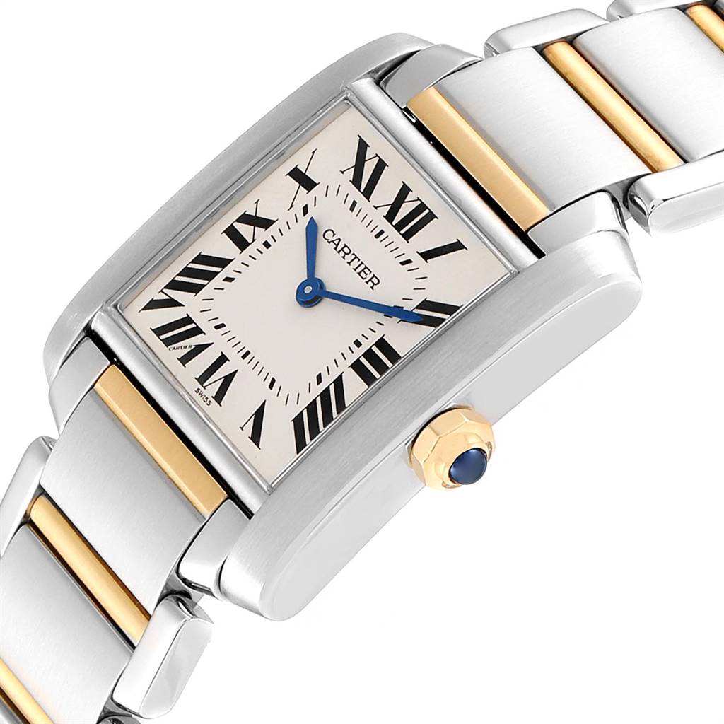 The image shows a close-up angle of a Cartier Tank Francaise W2TA0003 Women's Steel and Gold (two tone) Silver Dial W2TA0003 Women's Steel and Gold (two tone) Silver Dial watch, featuring its rectangular dial, crown, and part of the bracelet.