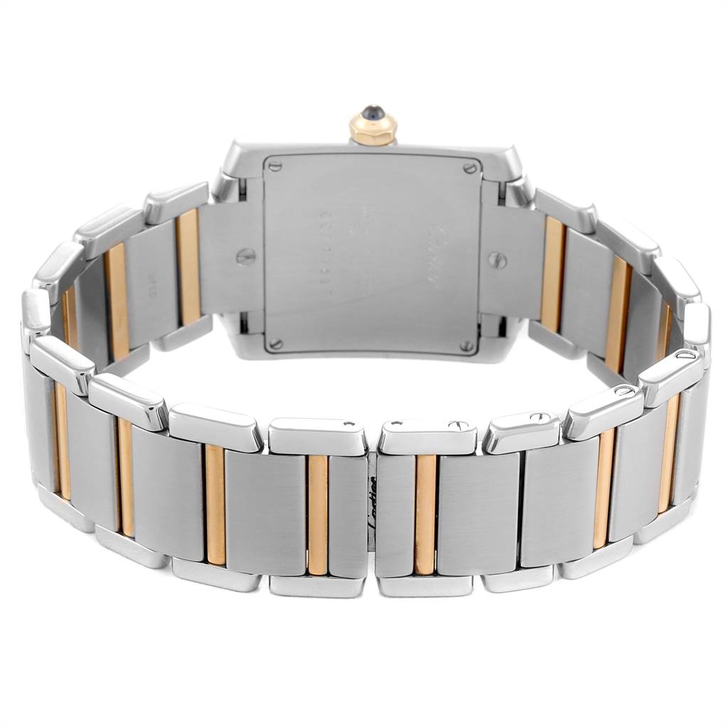 The image shows the back and bracelet of a Cartier Tank Francaise W2TA0003 Women's Steel and Gold (two tone) Silver Dial W2TA0003 Women's Steel and Gold (two tone) Silver Dial watch, highlighting its two-tone metal links.