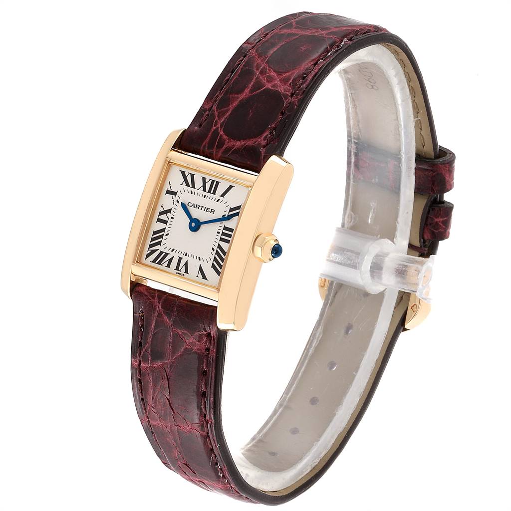 The image shows a Cartier Tank Française watch at an angle highlighting its rectangular face, Roman numerals, and leather strap.