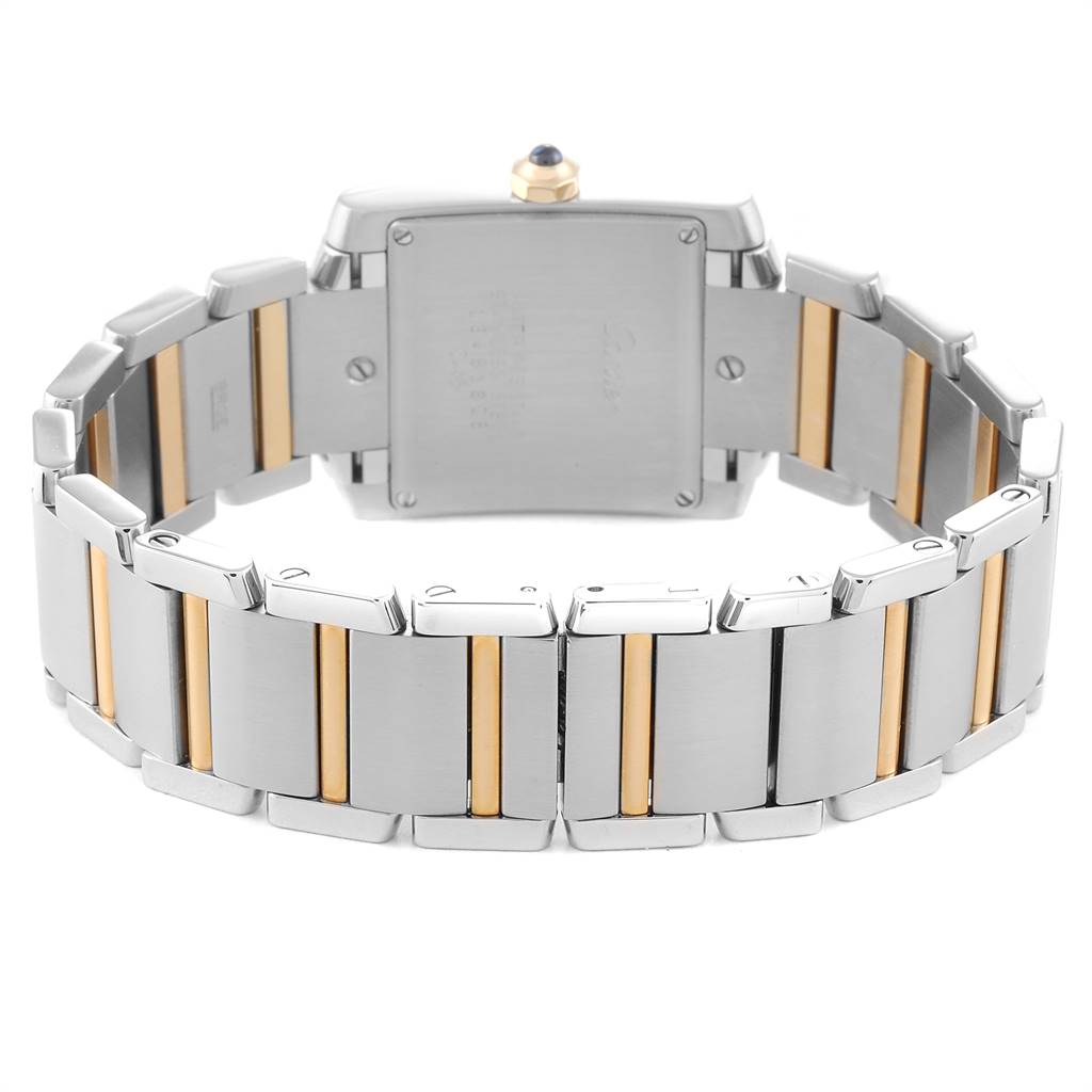 This image shows the back of a Tank Francaise model by Cartier, highlighting the two-tone metal bracelet and case back.