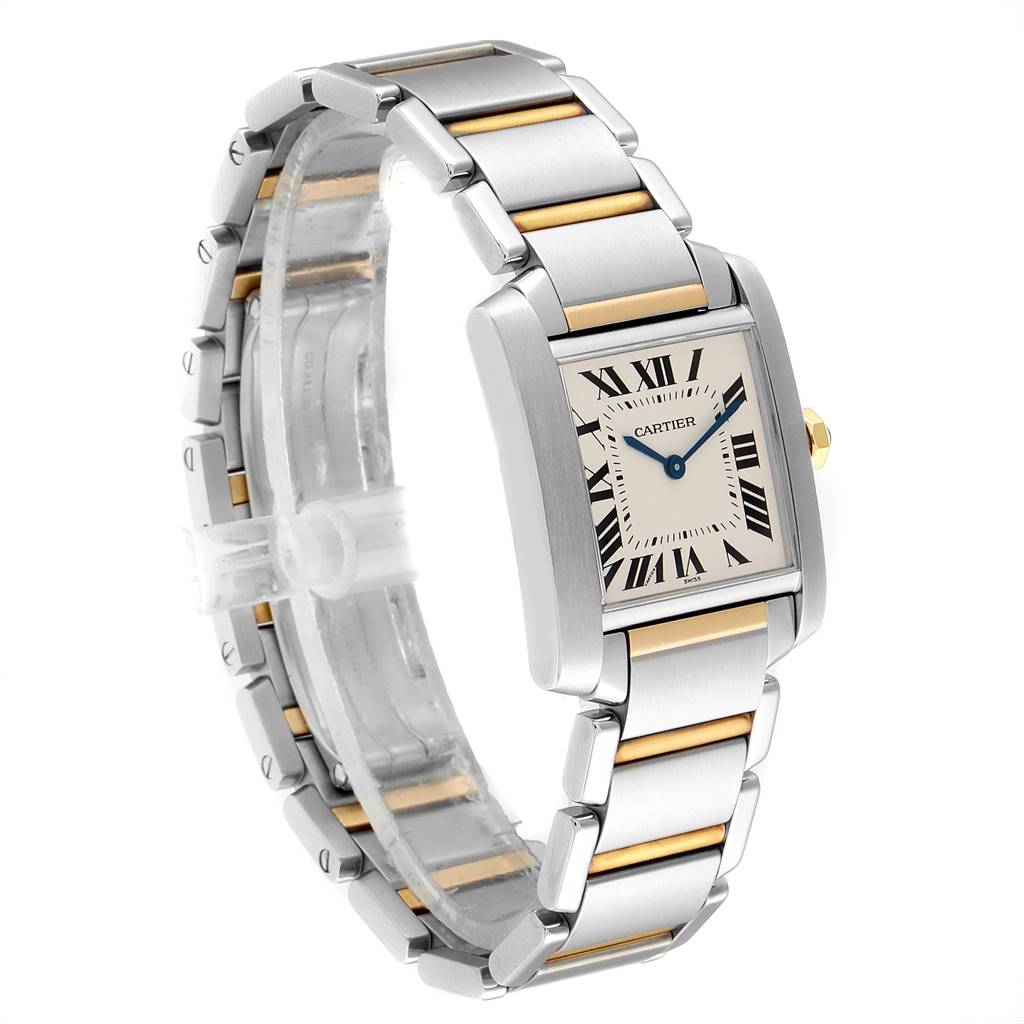 The image shows a Cartier Tank Francaise W2TA0003 Women's Steel and Gold (two tone) Silver Dial W2TA0003 Women's Steel and Gold (two tone) Silver Dial watch angled to display its face, bezel, and two-tone bracelet.