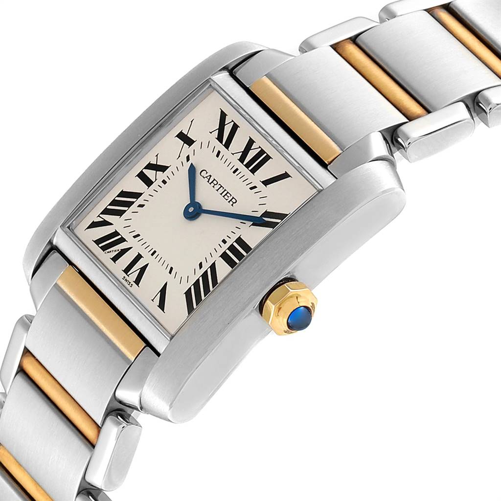 This image shows a close-up, angled view of a Cartier Tank Francaise W2TA0003 Women's Steel and Gold (two tone) Silver Dial W2TA0003 Women's Steel and Gold (two tone) Silver Dial watch, highlighting its face, crown, and part of the bracelet.