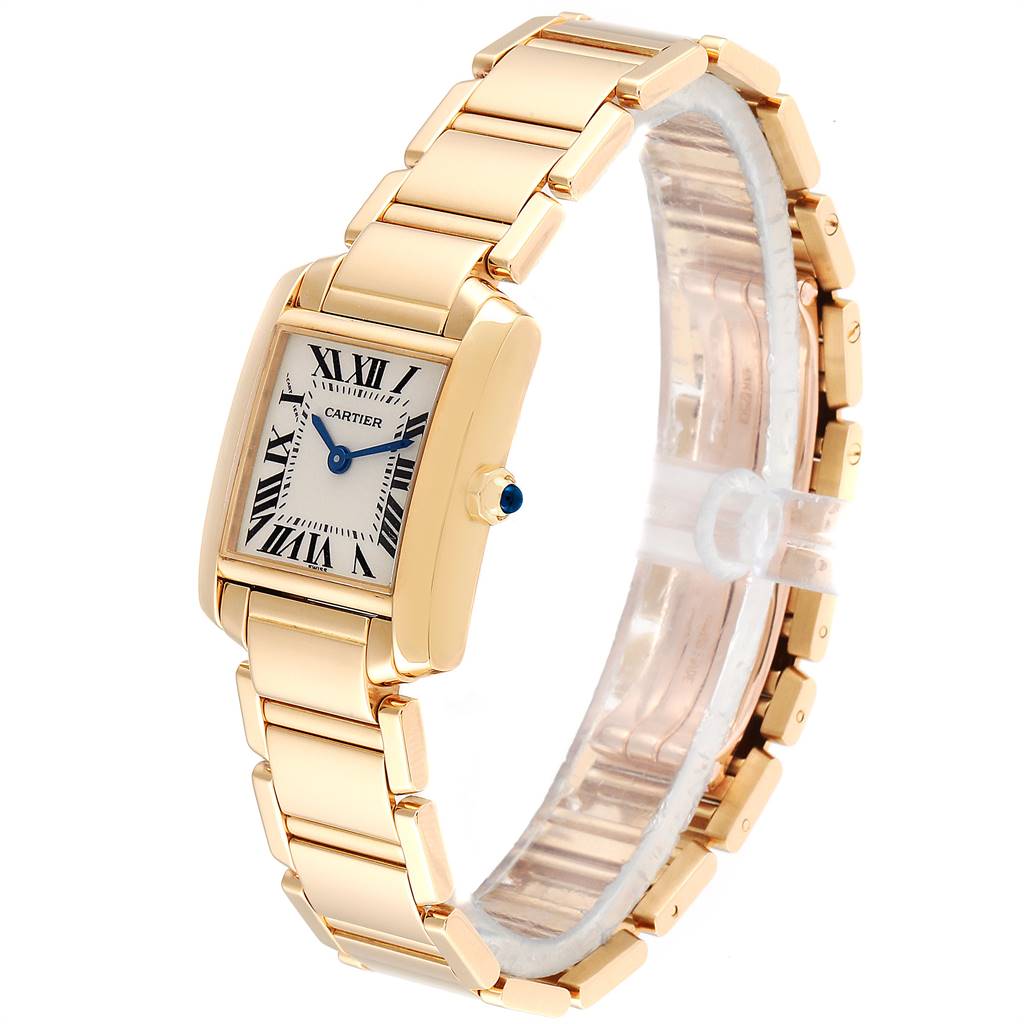 The image showcases a Cartier Tank Francaise W50002N2 Women's Yellow Gold Silver Dial W50002N2 Women's Yellow Gold Silver Dial watch at an angle highlighting its gold bracelet, case, and Roman numeral dial.