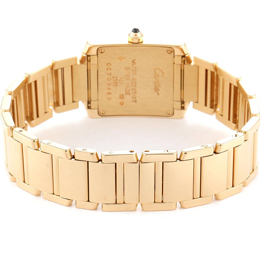 The image shows the back case and bracelet of a Cartier Tank Francaise W50002N2 Women's Yellow Gold Silver Dial W50002N2 Women's Yellow Gold Silver Dial watch, viewed from a rear angle.