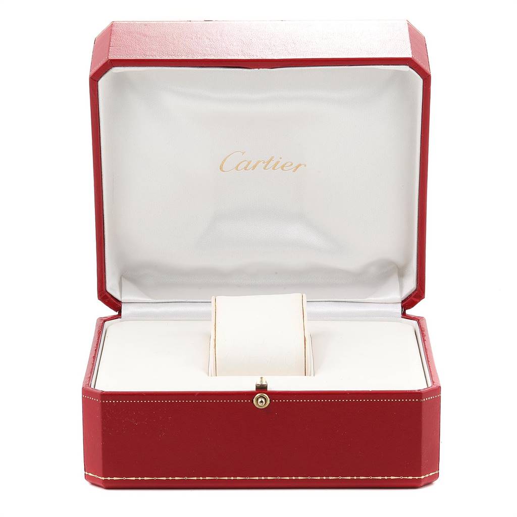 The image shows an open Cartier watch box for the Tank Française model, featuring a red exterior and a padded interior.