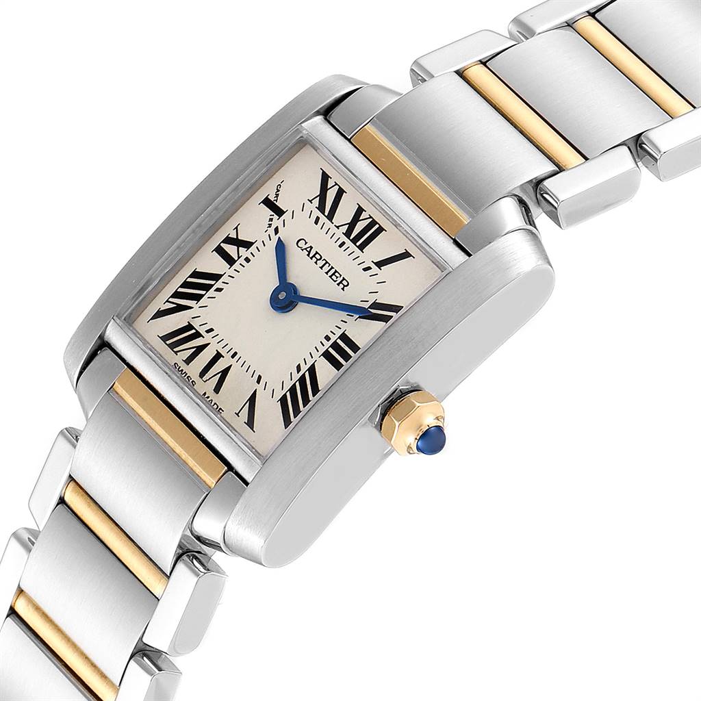 The image shows a Cartier Tank Francaise W51007Q4 Women's Steel and Gold (two tone) Silver Dial W51007Q4 Women's Steel and Gold (two tone) Silver Dial watch at an angle, highlighting its face, crown, and part of the two-tone bracelet.