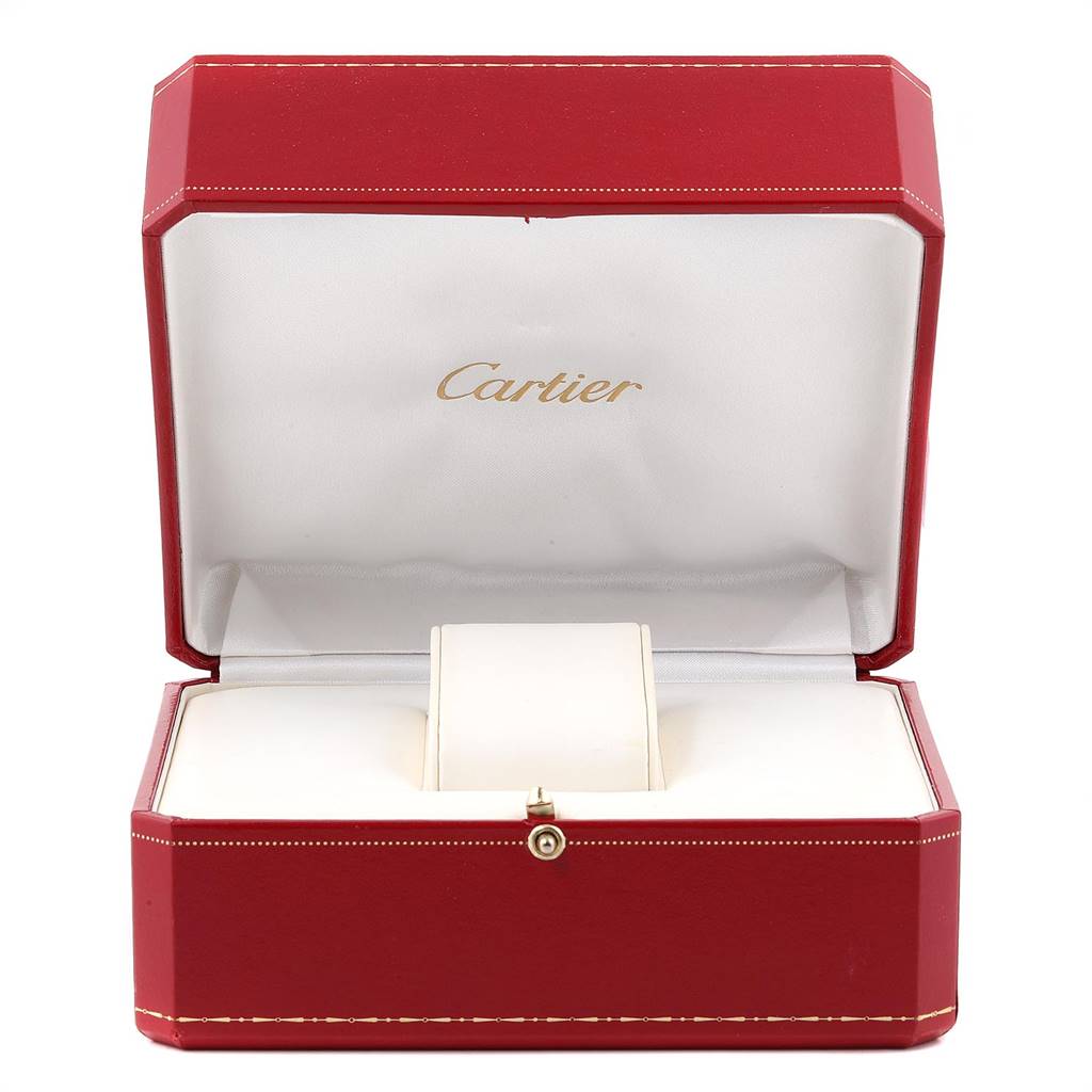 The image shows an open red Cartier box for the Tank Française watch, displaying the cushion where the watch would sit.