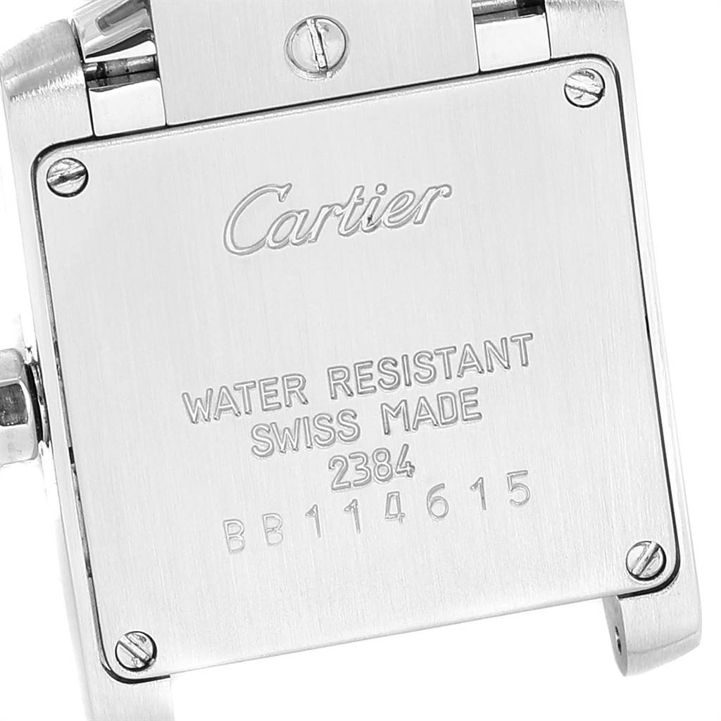 This image shows the back casing of a Cartier Tank Francaise W51008Q3 Women
s Stainless Steel Silver Dial W51008Q3 Women
s Stainless Steel Silver Dial watch, highlighting its water resistance and Swiss origin.