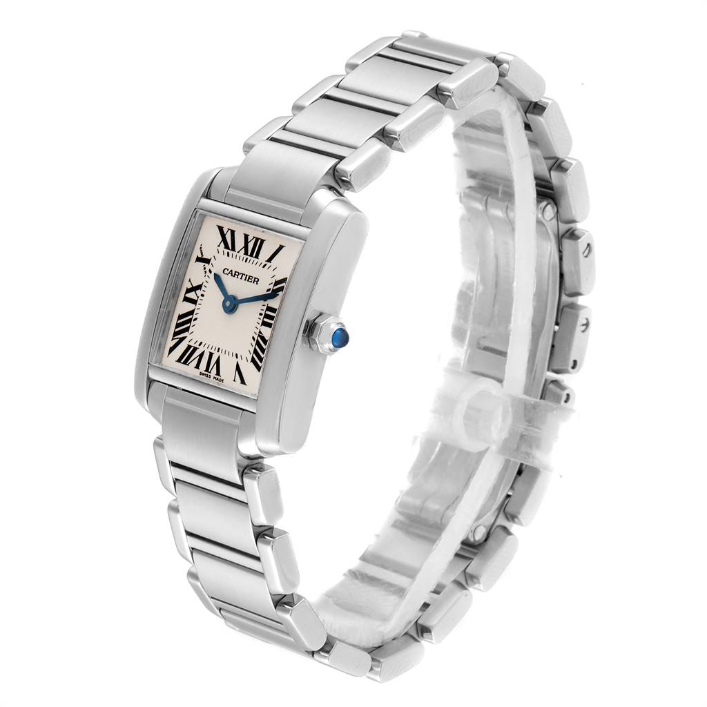 The Cartier Tank Française watch is shown at an angled view, highlighting its rectangular face, Roman numeral dial, and steel bracelet.
