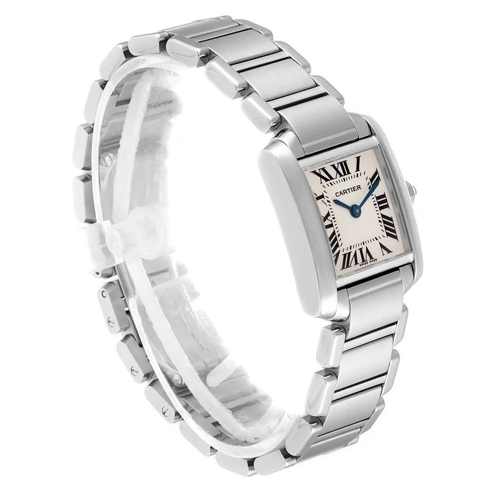 The Cartier Tank Française watch is shown at a three-quarter angle, displaying its stainless steel bracelet and rectangular dial.
