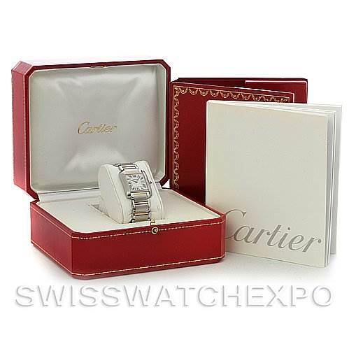 The image shows a Cartier Tank Française watch in its open red box, along with the warranty booklet and the outer packaging.