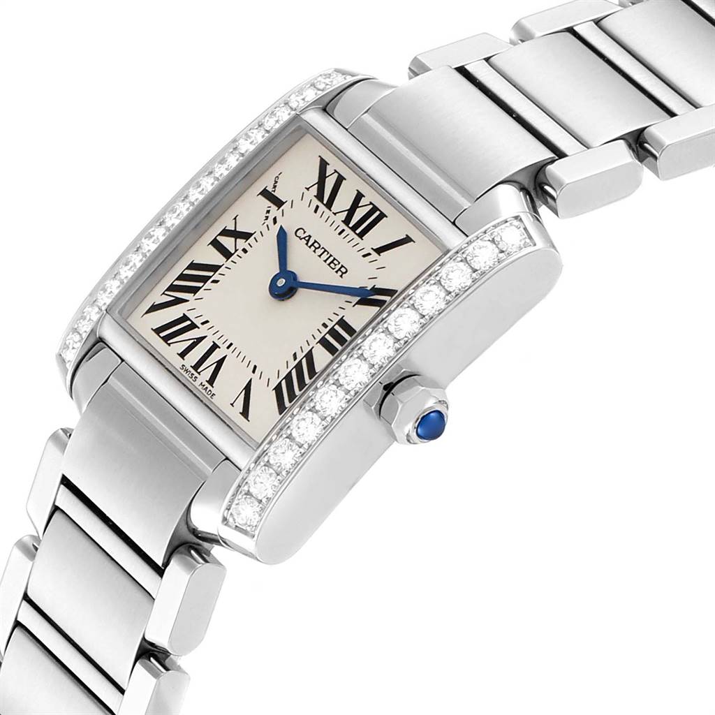 This is a close-up side angle of a Cartier Tank Francaise W4TA0008 Women
s Stainless Steel Silver Dial W4TA0008 Women
s Stainless Steel Silver Dial watch, highlighting the face, bezel, crown, and bracelet.