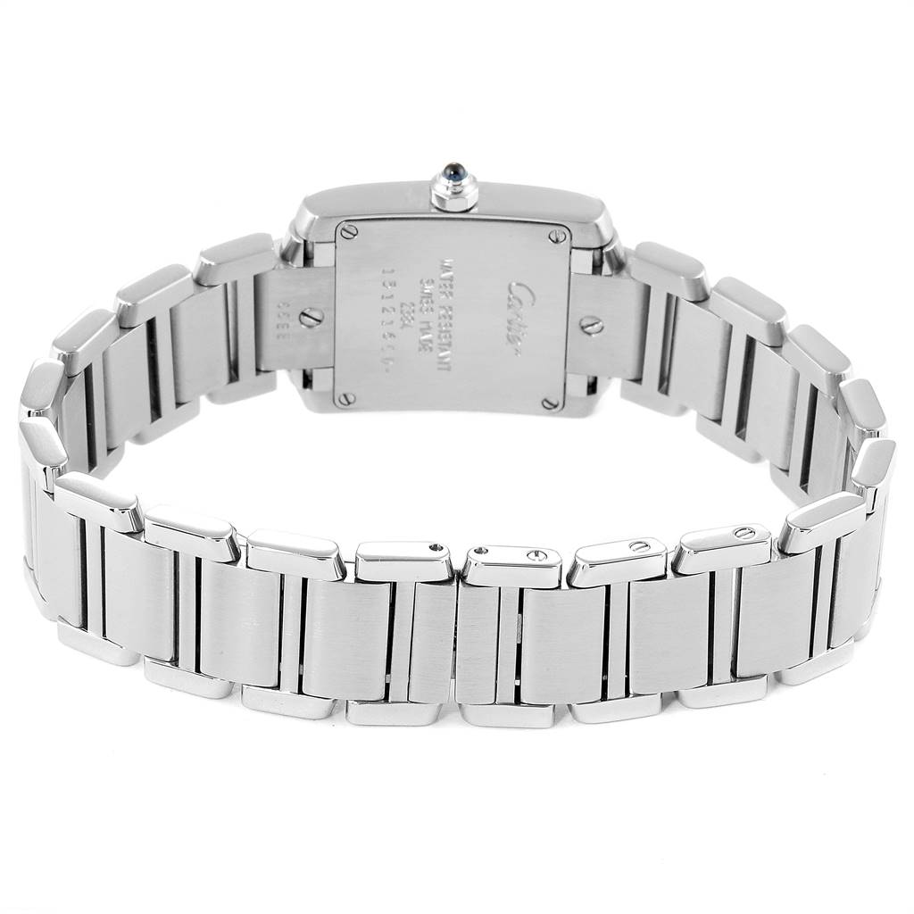 The image shows the back and bracelet of a Cartier Tank Française watch, highlighting its clasp and links.