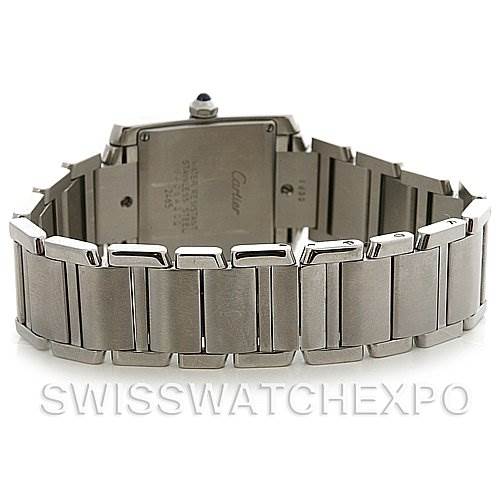 The image shows the back and bracelet of a Cartier Tank Française watch, with the clasp and links clearly visible.