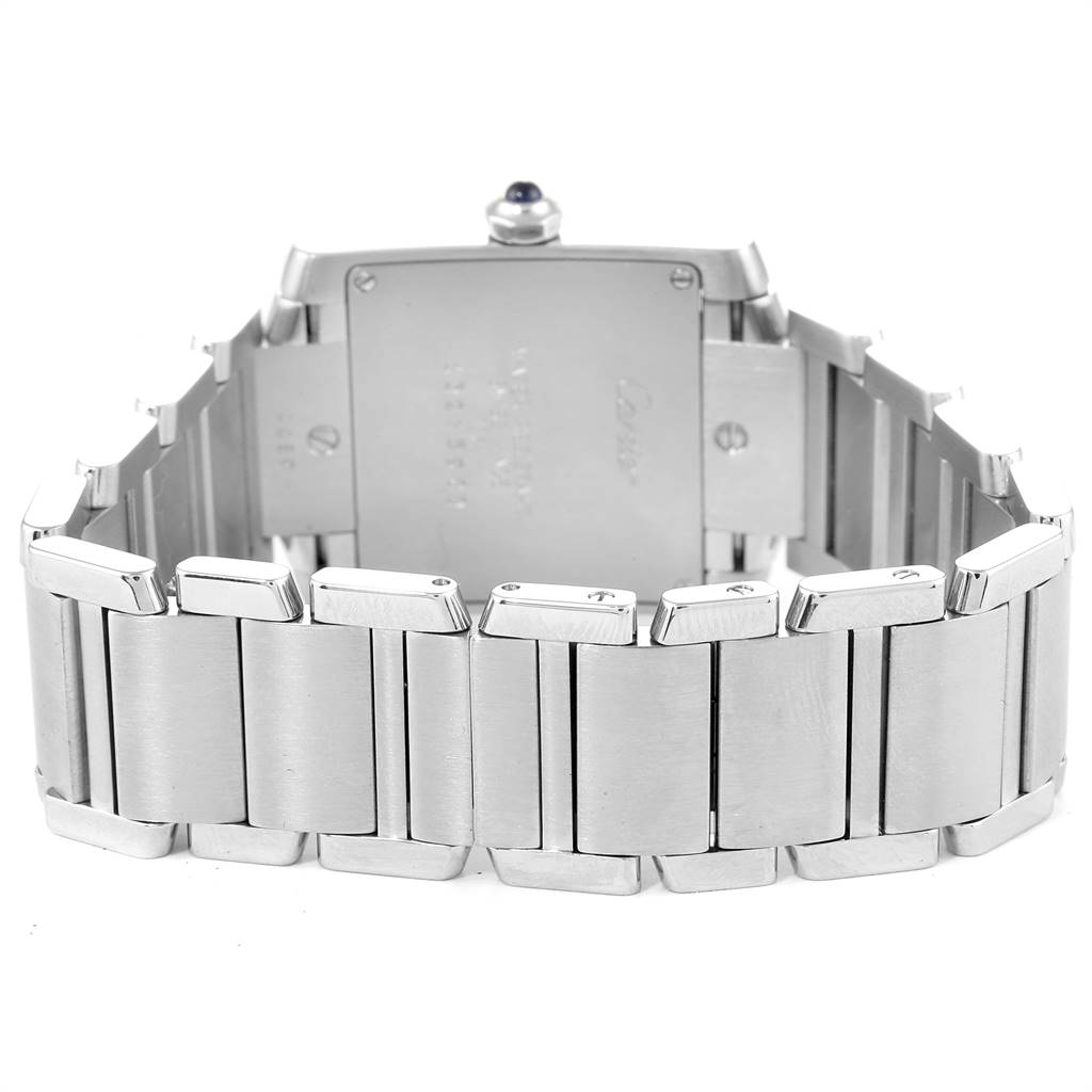 The image shows the back of a Cartier Tank Francaise WSTA0005 Women
s Stainless Steel Silver Dial WSTA0005 Women
s Stainless Steel Silver Dial watch, focusing on its metallic bracelet and case back.