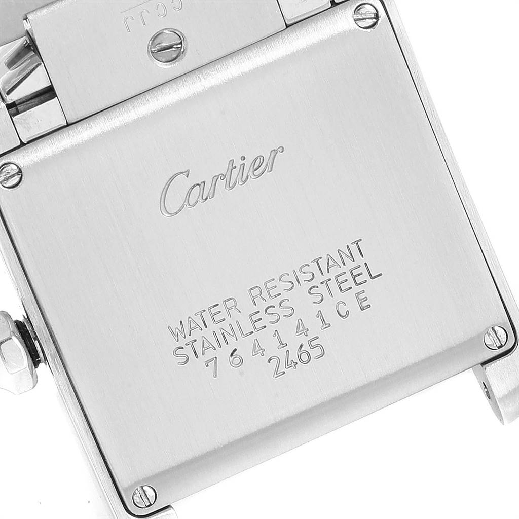 The image shows the back case of a Cartier Tank Française watch, highlighting the water resistance and stainless steel details.