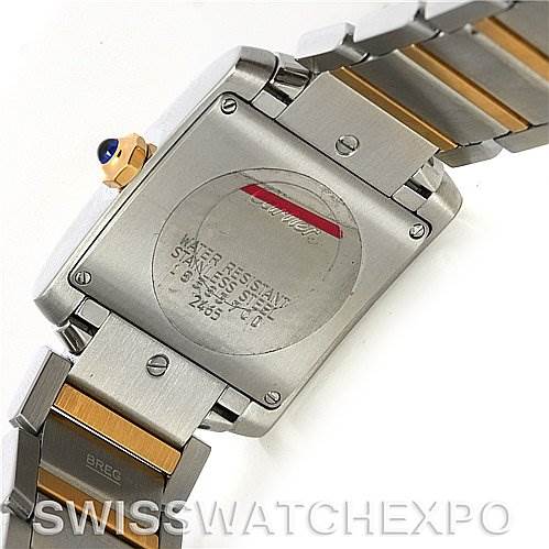 The image shows the back case and part of the bracelet of a Cartier Tank Francaise W51012Q4 Women's Steel and Gold (two tone) Silver Dial W51012Q4 Women's Steel and Gold (two tone) Silver Dial watch.