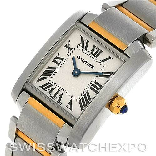 This image shows a close-up, angled view of the Tank Française watch by Cartier, highlighting the face, bracelet, and crown.