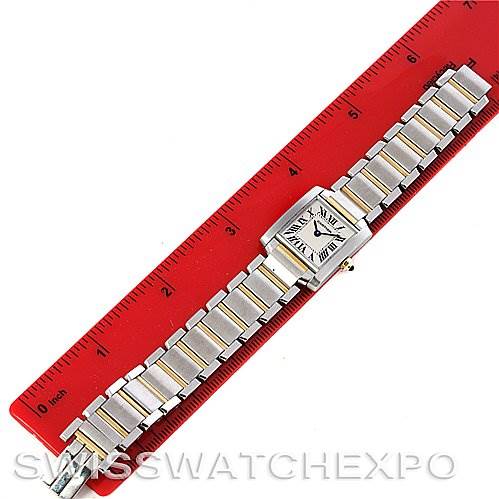 The Cartier Tank Francaise W51007Q4 Women's Steel and Gold (two tone) Silver Dial W51007Q4 Women's Steel and Gold (two tone) Silver Dial watch is displayed flat with its full bracelet and dial visible, aligned next to a ruler for scale.