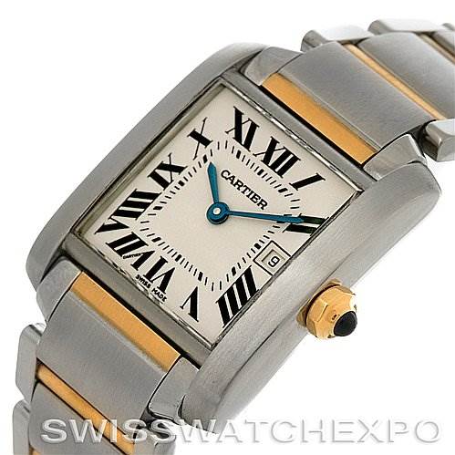 The image shows a Cartier Tank Francaise W51012Q4 Women's Steel and Gold (two tone) Silver Dial W51012Q4 Women's Steel and Gold (two tone) Silver Dial watch at an angle, highlighting the dial, Roman numerals, crown, and part of the stainless steel and gold bracelet.