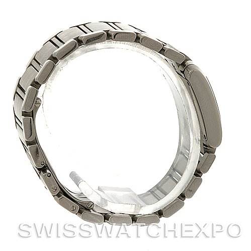 The image shows a side view of a Cartier Tank Française watch, focusing on its stainless steel bracelet and clasp.