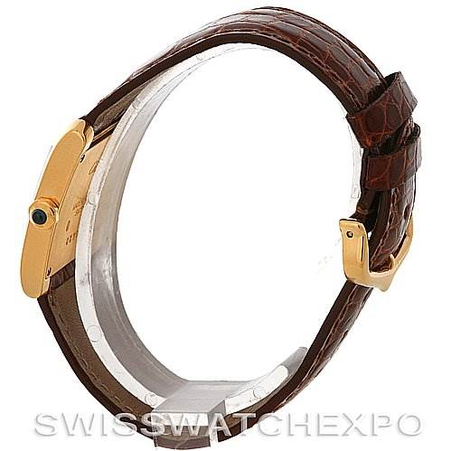 The image shows the Cartier Tank Française watch from a side angle, highlighting its leather strap, buckle, and case.