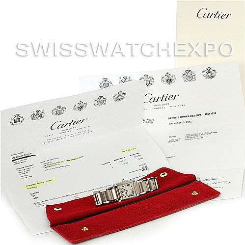 This image shows a Cartier Tank Francaise W51012Q4 Women's Steel and Gold (two tone) Silver Dial W51012Q4 Women's Steel and Gold (two tone) Silver Dial watch placed on a red pouch along with its documentation and service receipts.