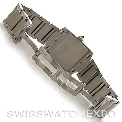 The image shows the underside of a Cartier Tank Francaise W51011Q3 Women's Stainless Steel Silver Dial W51011Q3 Women's Stainless Steel Silver Dial watch, featuring the case back and opened clasp.