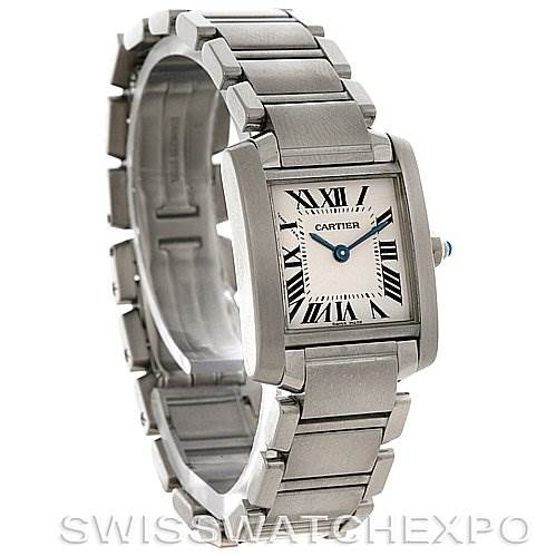 The image shows a Cartier Tank Française watch angled slightly from the top, highlighting its rectangular case, silver bracelet, and face with Roman numerals.