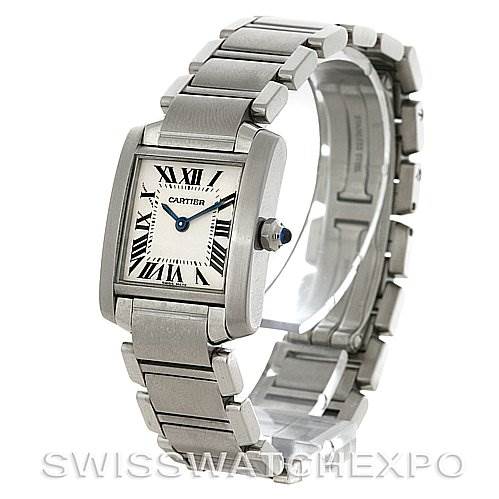 The image shows a Cartier Tank Française watch at a tilted angle, highlighting its face, bracelet, and crown.