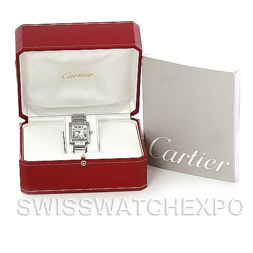 The image shows a Cartier Tank Française watch, its red Cartier box, and a booklet, all viewed from the front.