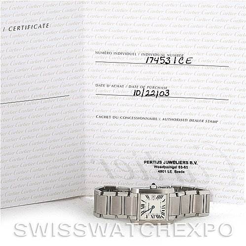 The image displays a Tank Francaise model by Cartier, shown from the front with the certificate and warranty card behind it.