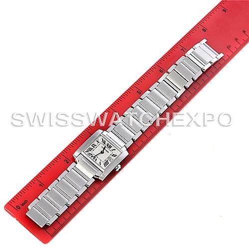 The image shows a Cartier Tank Francaise W51011Q3 Women's Stainless Steel Silver Dial W51011Q3 Women's Stainless Steel Silver Dial watch laid flat next to a red ruler, displaying the full bracelet and face from the top view.