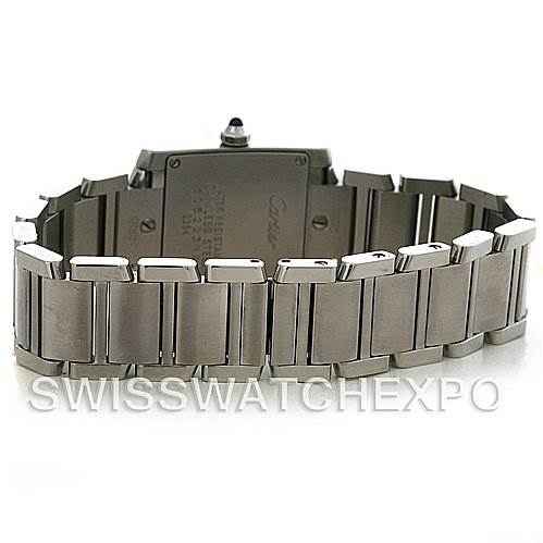 This image shows a Tank Francaise model by Cartier, showcasing the back of the watch and its metal bracelet.