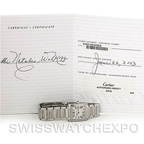 The image shows a Cartier Tank Francaise W51011Q3 Women's Stainless Steel Silver Dial W51011Q3 Women's Stainless Steel Silver Dial watch with its band, displayed in front of its certificate of authenticity.