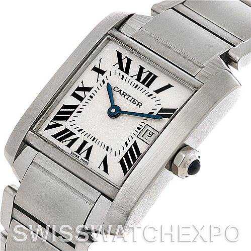 This image shows a close-up angled view of a Cartier Tank Francaise W51011Q3 Women's Stainless Steel Silver Dial W51011Q3 Women's Stainless Steel Silver Dial watch, featuring the dial, Roman numerals, blue hands, and part of the metal bracelet.