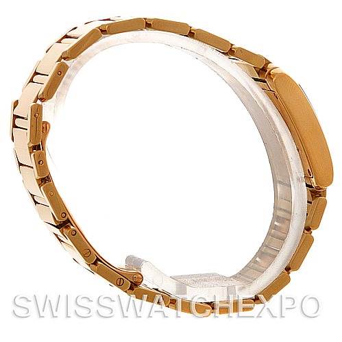 The image shows a Cartier Tank Française watch from a side angle, highlighting its bracelet and clasp.