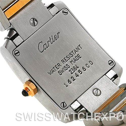The image shows the back casing of a Cartier Tank Française watch, displaying the water resistance and Swiss-made markings.