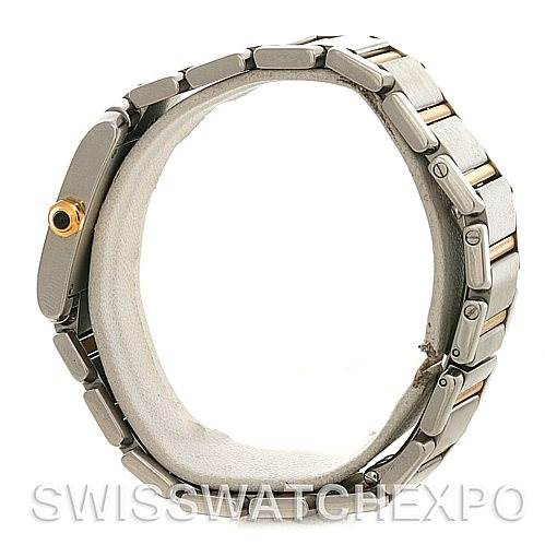 The image shows a side view of a Cartier Tank Francaise Women's Steel and Gold (two tone) Silver Dial Women's Steel and Gold (two tone) Silver Dial watch, focusing on the band and the winding crown.