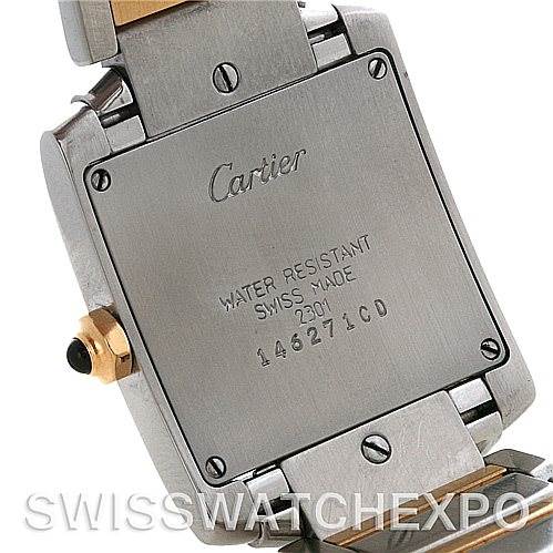 The image shows the back case of the Cartier Tank Francaise Women's Steel and Gold (two tone) Silver Dial Women's Steel and Gold (two tone) Silver Dial watch, featuring the brand's engraving and serial numbers.