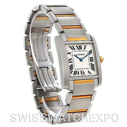 The image shows a side angle of a Cartier Tank Française watch, highlighting its steel and gold bracelet and square face with Roman numerals.