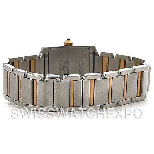 The image shows the back view of a Cartier Tank Française watch, focusing on the clasp and bracelet.